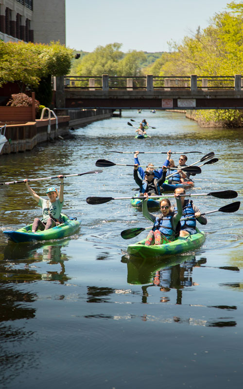 kayak bike and brew paddlers on the river