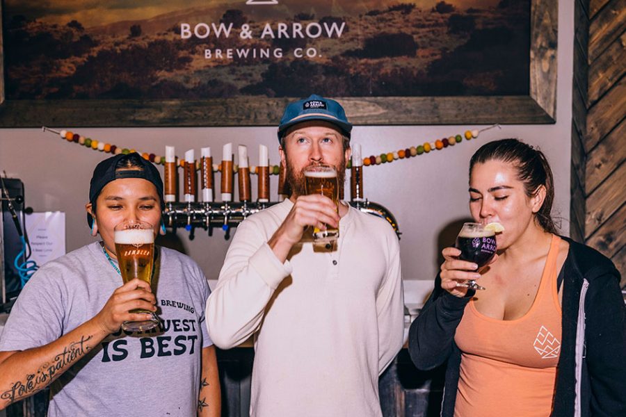 brewery-employees-tasting-beer-bow-and-arrow-brewing-co