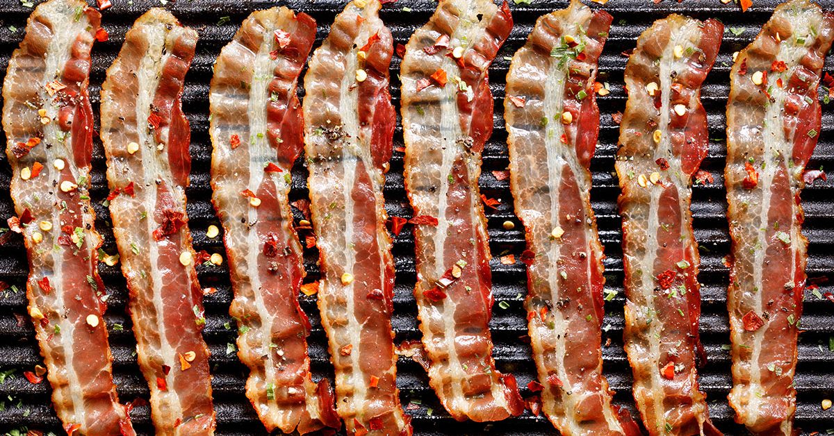 strips of bacon on grill