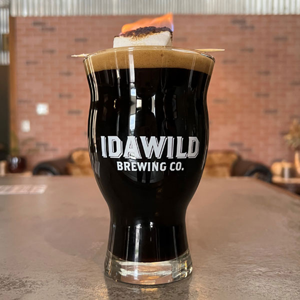Idahwild stout beer with flaming marshmallow on top