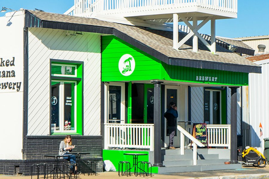 white and green beach style brewery exterior