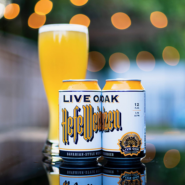 life oak hefeweizen beer cans with poured beer