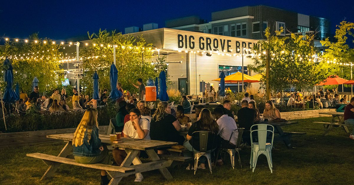 big grove location with patio at dusk