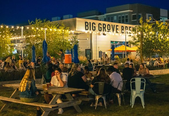 big grove location with patio at dusk